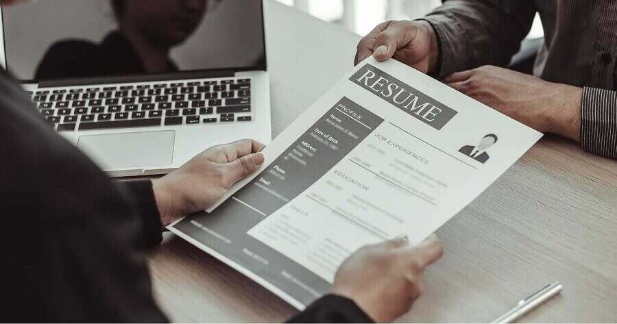 Somebody is giving a CV to someone Somebody is giving a CV to someone